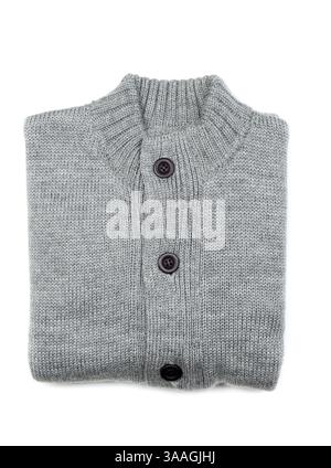 Grey knit sweaters folded on white background Stock Photo