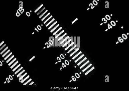 Perspective macro shot of the equalizer display of the professional digital betacam recorder. Shallow dof. Visible data: sound scale, decibels Stock Photo