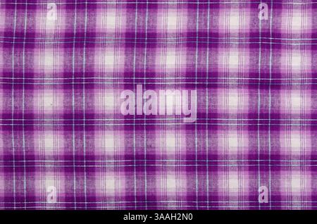Purple cloth, checkered background Stock Photo