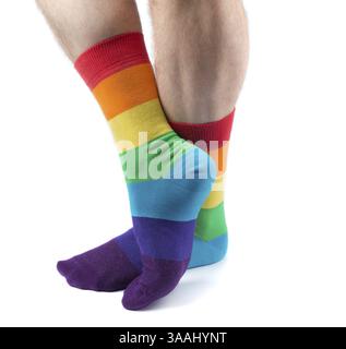 Mens hairy legs in colored striped socks fun. Isolate on white Stock Photo