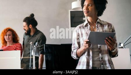 African american woman with tablet, innovation in research and programming for future app technology Stock Photo