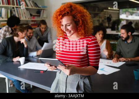 Success business woman with tablet, analytics and developer for startup business website IT software Stock Photo