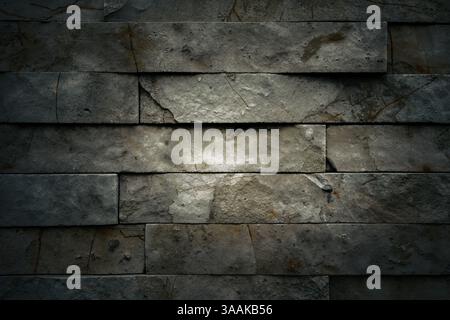 Interesting facade decorative bricks under dramatic lighting. Stock Photo
