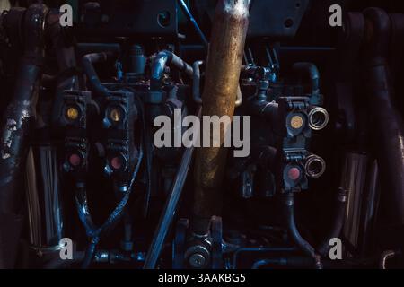 Various attachments on the rear of the tractor, seen up close. Stock Photo