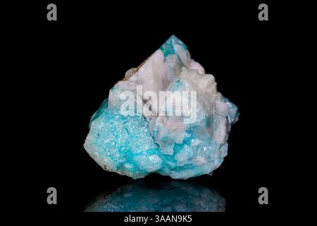 Natural rough Phoenix stone (Fynchenite, Ajoite) on dark background Stock Photo