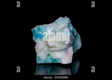 Closeup natural rough Phoenix stone (Fynchenite, Ajoite) on dark background Stock Photo