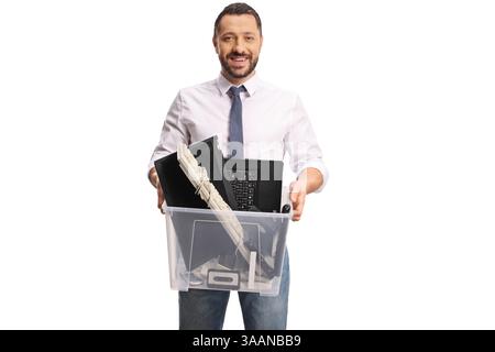 Businessman holding a plastic box with old electronic devices isolated on white background Stock Photo