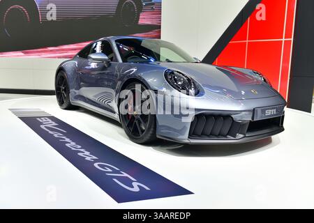 Thailand-March 26,2025: The Porsche 911 Carrera GTS high-performance, rear-engine sports car at the 46 Bangkok International Motor Show Stock Photo