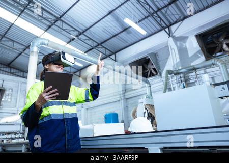 Modern Factory Innovation Technology in Industry, Technician female using VR Virtual Reality Headset in Wood furniture design workshop. Stock Photo
