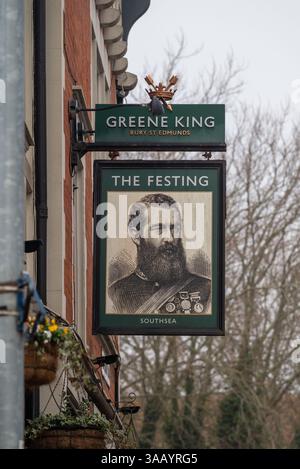 Hanging sign for the Festing public house with the Greene King emblem ...