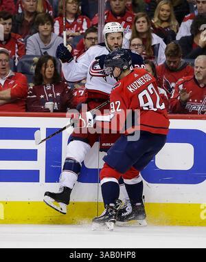 Washington Capitals center Boone Jenner (22) and Buffalo Sabres ...