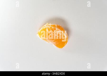 Pattern of whole tangerines or mandarin orange fruits and peeled segments isolated on white background. Stock Photo
