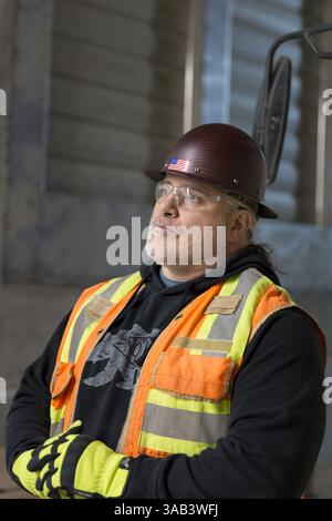 March 27, 2018 - Seattle, Washington, United States - Seattle, Washington: Seattle Tunnel Partners' superintendent Ben Taylor on the upper deck of the SR 99 Tunnel. The Alaskan Way Viaduct Replacement Programâ€™s road decks have been completed and the tunnelâ€™s operational and safety systems are currently being installed. The bored road tunnel is replacing the Alaskan Way Viaduct and will carry State Route 99 under downtown Seattle from the SODO neighborhood to South Lake Union. After suffering delays in the tunneling process, the two mile long waterfront tunnel is scheduled to open in late 2 Stock Photo