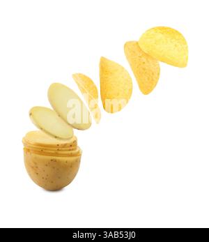 Raw potato slices transforming into crispy chips in air on white background Stock Photo
