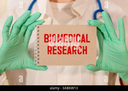 Research Ethics text on speech bubble with magnifying glass top view on blue background Stock Photo