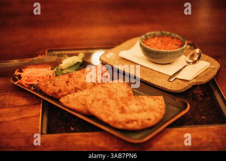 Friends, beers and delicious food, the best plan! Stock Photo