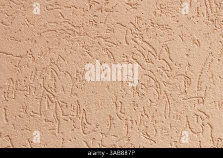 Texture of beige wall covered with limestone plaster, natural sand and stone cover material, background for wallpapers or web-banner design Stock Photo