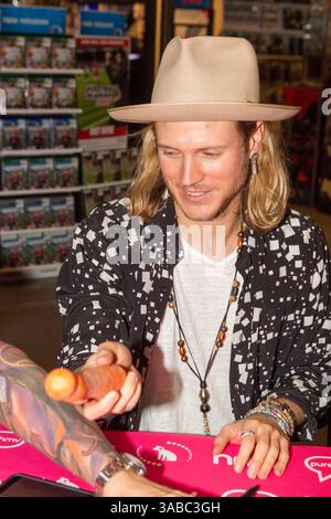 Dougie Poynter Of McBusted Sign Their New Single Air Guitar At HMV dougie-poynter-of-mcbusted-sign-their-new-single-air-guitar-at-hmv