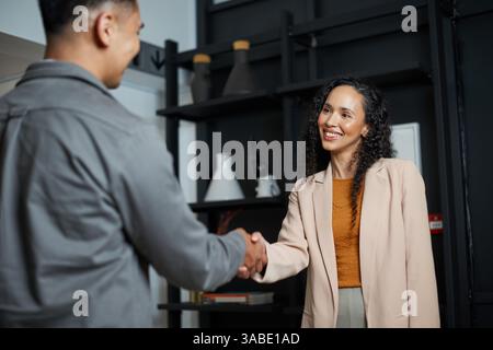 Professional Business Meeting Between Colleagues in a Modern Office Setting Stock Photo