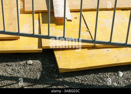 construction site barrier and wooden boards Stock Photo