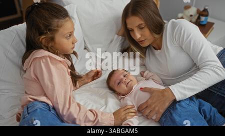 Mother spending quality time with her daughters in a cozy living room, embodying love and warmth in a family home setting. Stock Photo