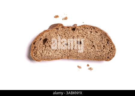 Slice of Sourdough Bread isolated on white background. Yeast rye or wheat artisan bread, design elements. Stock Photo