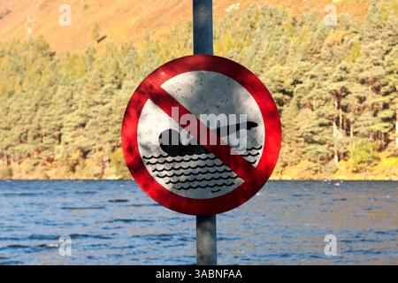 Danger- No Swimming Sign at Glendalough Upper Lake , County Wicklow , Ireland. Stock Photo