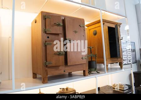 old wooden refrigerators on display in a museum in Serbia Stock Photo