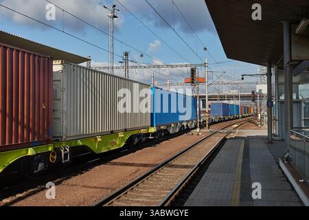Asda Container Train Freight train with cargo containers passing by countryside. Train ...