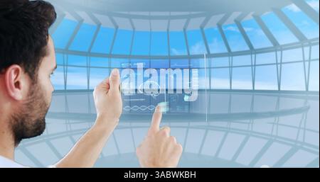 Using futuristic digital tablet, man interacting with virtual interface Stock Photo
