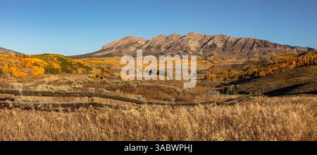 In the Elk mountains near Gunnison CO lies the over 4 mile long Anthracite range.  Surrounded by autumn color, this is a sight to behold. Stock Photo