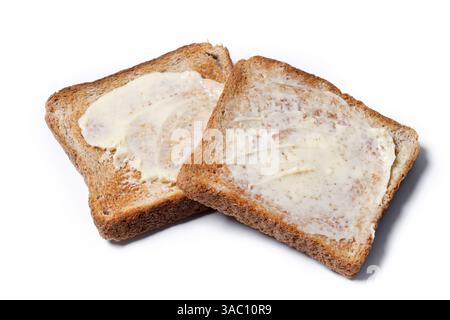 Sliced fresh bread and butter isolated on white background Stock Photo