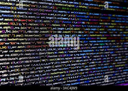 Software source code. Programming code. Programming code on computer screen. Developer working on program codes in office. Source code photo. Technolo Stock Photo