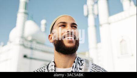Thinking, outdoor and mosque with Islamic man, religion and smile with faith, arabic culture and gratitude. Muslim person, traditional clothes and Stock Photo