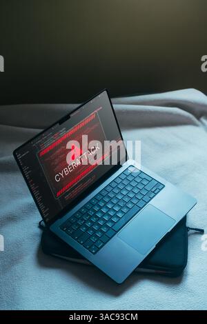 Desktop with system hacked alert hologram interface. Compromised information concept. Internet virus cyber security and cybercrime. Stock Photo