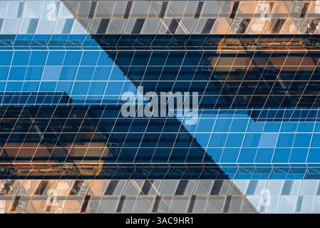Futuristic Glass Facade with Abstract Symmetrical Patterns, Sleek Technological Background with Mirrored Geometric Illusions Stock Photo