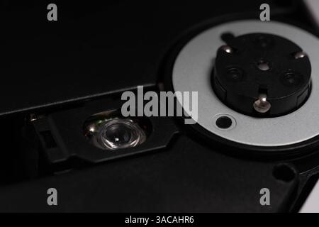 Close up of a black CD DVD disk drive on white background Stock Photo