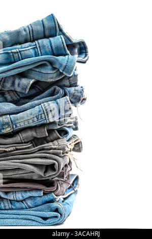 Stack of jeans isolated on white background Stock Photo