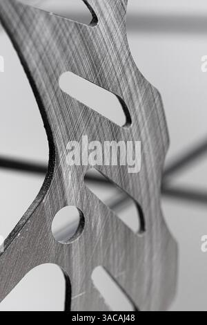 Closeup bicycle disc brake on white background Stock Photo