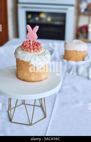 Gentle springtime nostalgia radiates from a freshly baked Ukrainian Easter cake, adorned with delicate bunny and bird toppings, promising sweet moment Stock Photo