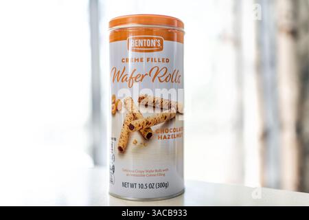 Roseland, USA - February 4, 2025: Benton's wafer rolls sweet chocolate hazelnut filling dessert food macro closeup in container box packaging Stock Photo