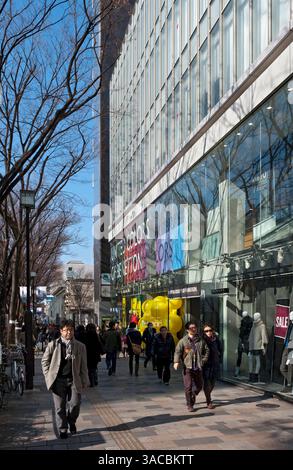 Shoppers strolling near Omotesando Hills shopping mall along Omotesando-dori Street in the upscale Shibuya ward of Tokyo, Japan. Stock Photo
