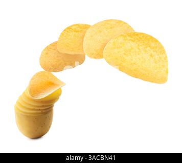 Raw potato slices transforming into crispy chips in air on white background Stock Photo