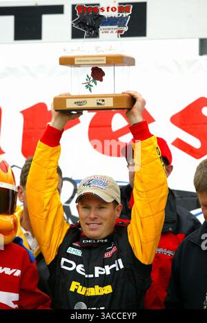 Scott Sharp (USA) Kelley Racing Dallara/Chevrolet takes the chequered ...