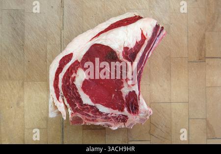 red meat beef steak on wooden butcher's block Stock Photo