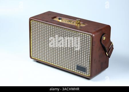 Brown Vintage style portable wireless speaker isolated on white background. Stock Photo