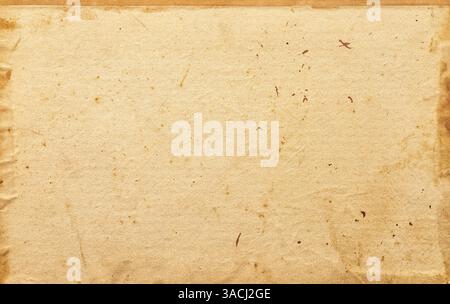 Old paper manuscript with yellowed texture from old age as background Stock Photo