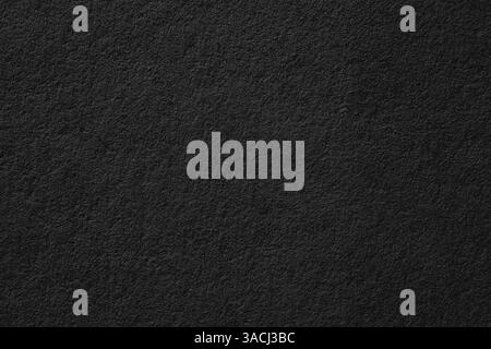 abstract texture of black poster. dark paper background with vignette Stock Photo