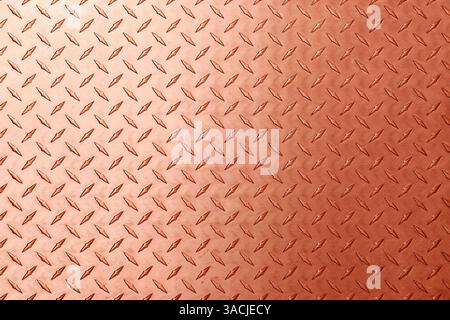 bronze or copper texture with diamond print, metal background. Stock Photo
