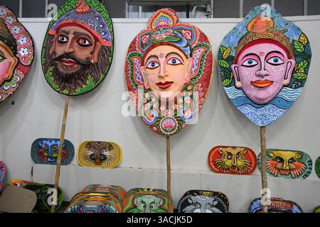 Student of Faculty of Fine arts of Dhaka University painting masks for colorful preparation to celebrate upcoming Bengla New Year 1432 in Dhaka, Bangladesh, on April 04, 2025. Pahela Baishakh (the first day of the Bangla month) can be followed back to its origins during the Mughal period when Emperor Akbar introduced the Bangla calendar to streamline tax collection while in the course of time it became part of Bengali culture and tradition. Stock Photo